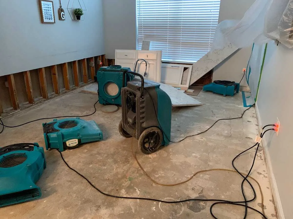 Dehumidifier in flood-cut room for Water Damage Restoration in Trumbull